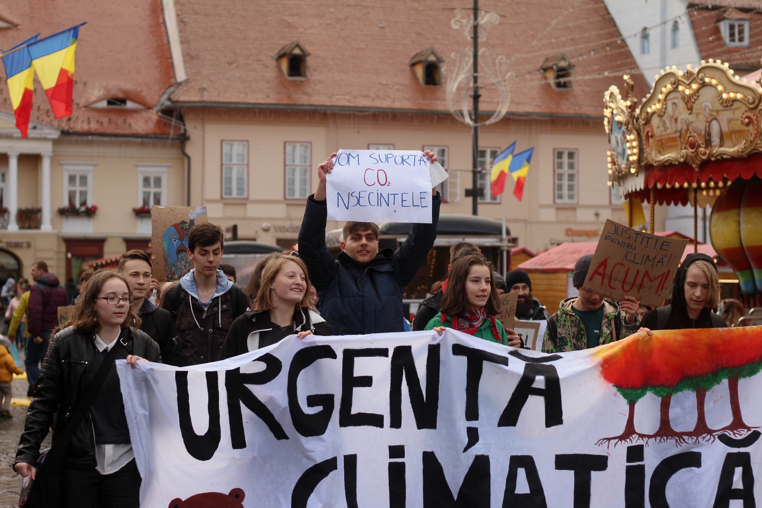 Paula and other climate strikers marching through a Christmas Market.